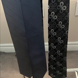 Men's Grey and Black Patterned Ties
3 ties